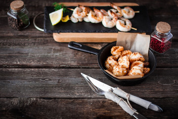 Grilled shrimps on frying pan