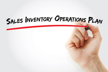 Hand writing Sales Inventory Operations Plan with marker, concept background
