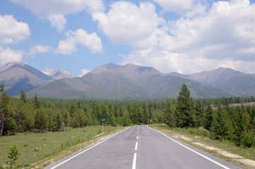 Tarmac road leading to the Sayan Mountains