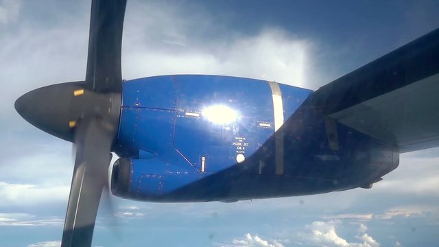 Small airplane propeller rotating during flight