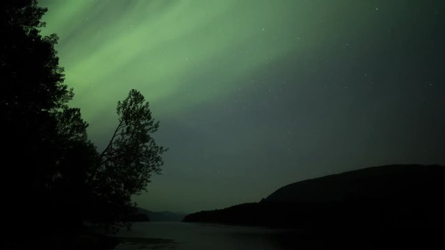 aurora borealis in mountain landscape