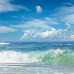 Fantastic Waves in the warm Sea Water and blue sky