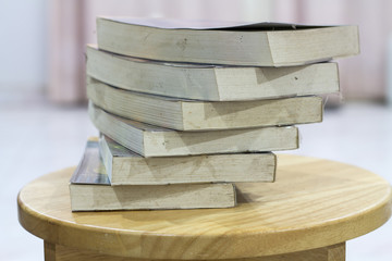 books on a wooden table