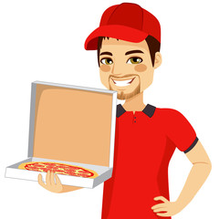 Pizza delivery man holding open cardboard box with pepperoni pizza inside