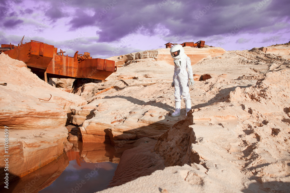 Poster futuristic astronaut on another planet, mars. image with the effect of toning
