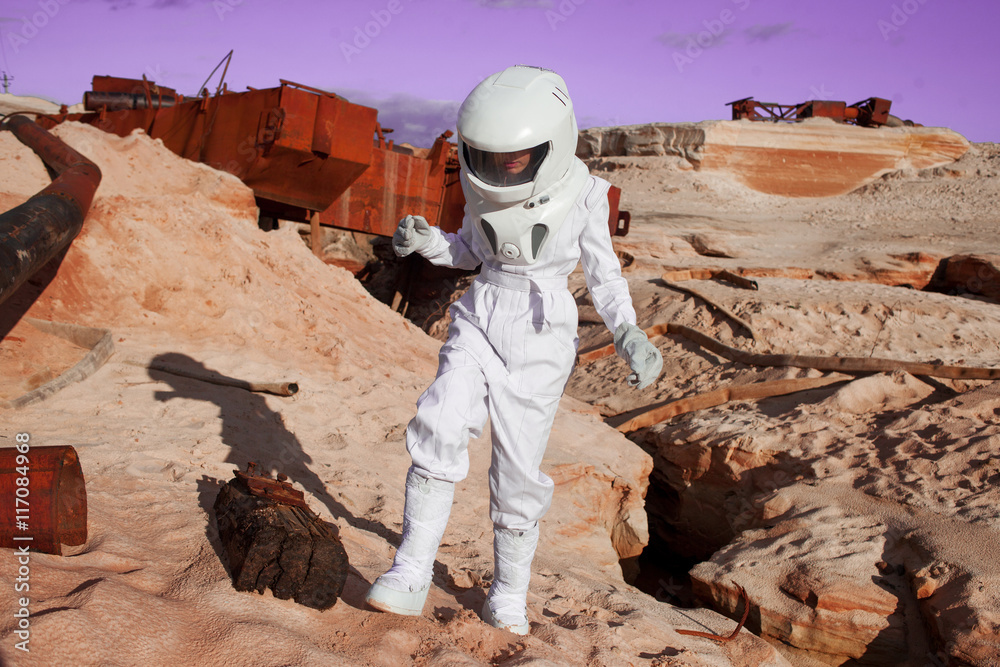 Poster futuristic astronaut on another planet, mars. image with the effect of toning