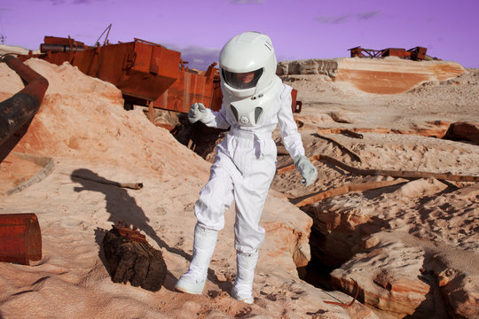 futuristic astronaut on another planet, Mars. image with the effect of toning