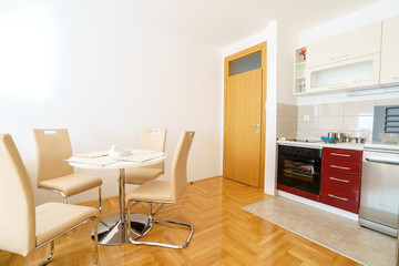 Interior of a guest house room with kitchen