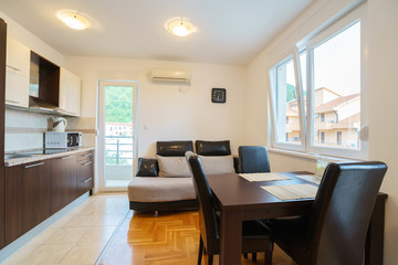 Interior of a guest house room with kitchen