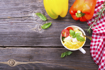 omelet in a mug prepared in microwave . horizontal permission. selective focus