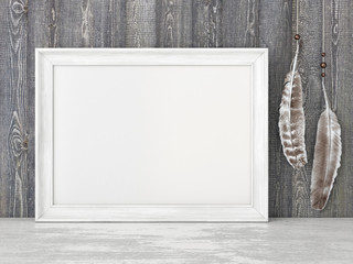 Horizontal vintage poster mockup with white frame and feathers on empty wooden wall background. 3D rendering.