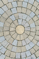 Brown gray tiled floor in circular shape