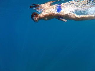 Fototapeta na wymiar man dives into the sea