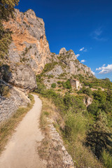 Obraz premium Moustiers Sainte Marie village with rocks in Provence, France