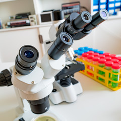 Science microscope on lab bench. Microbiology laboratory. Water sampling procedure for microbiological analysis