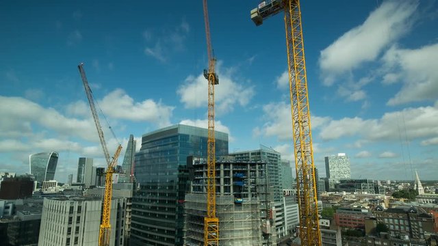 london city skyline with cranes and construction