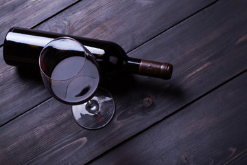 Red wine on dark wood