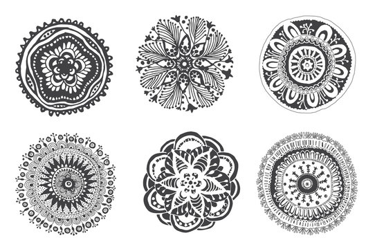 Set of hand drawn mandalas. Cfn be used for coloring books, tattoo, mehendi and others.