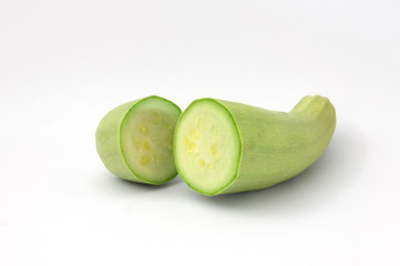 white zucchini cut in half isolated
