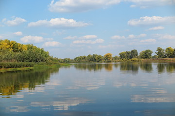 September river against a blue sky