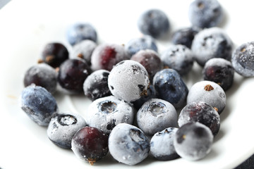Frozen berries on a white plate