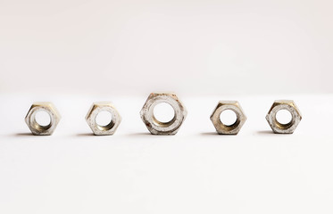 Metal nuts isolated on the white background