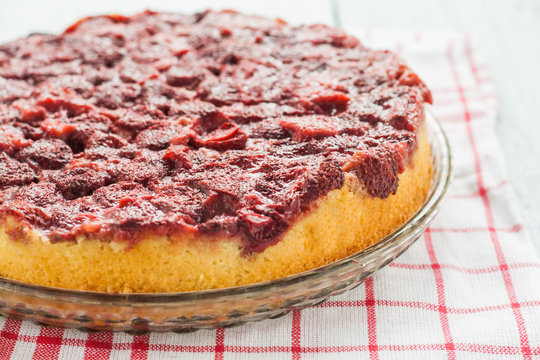 pie with fresh strawberries on a plate