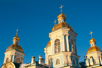 Fototapeta na wymiar evening view of Nikolsky Cathedral on blue sky background. Russia Saint Petersburg