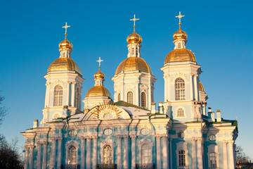 Fototapeta na wymiar evening view of Nikolsky Cathedral on blue sky background. Russia Saint Petersburg