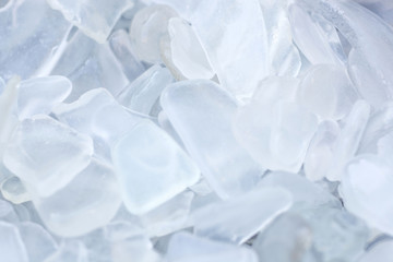 Fototapeta premium Shaded Clear Fragments of Beach Glass