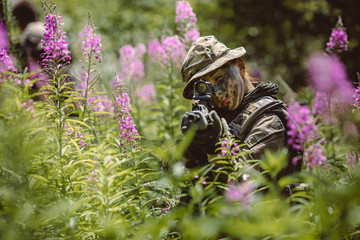 Special forces soldiers with weapon take part in military maneuv