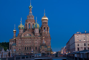 Fototapeta na wymiar Summer view of the Field of Mars (Marsovo Polye) and Church of the Savior on Spilled Blood (Cathedral of the Resurrection of Christ) in wite night of Saint-Peteresburg city, Russia