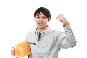 ガッツポーズの労働者