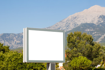Large horizontal Billboard for advertising on a background of mountains