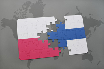 puzzle with the national flag of poland and finland on a world map background.