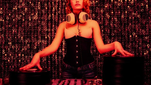 beautiful female dj with pile of vinyl records