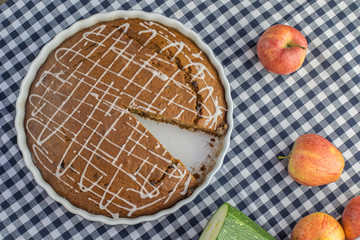 Top View on Sliced Sweet gingerbread zucchini Pie with lemon top