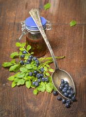 blueberries in the detail on a wooden table