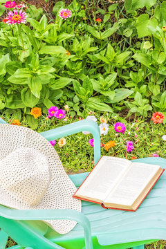 Relax with a book in the blooming garden