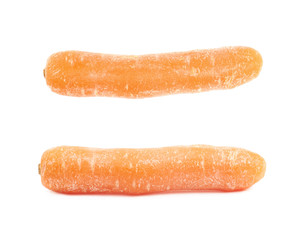 Single baby carrot isolated