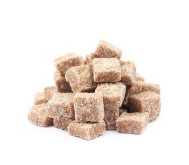 Pile of brown sugar cubes isolated