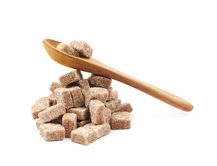 Pile of brown sugar cubes isolated