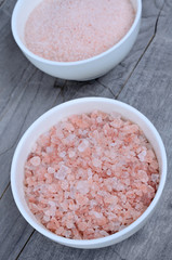 Fototapeta na wymiar Ceramic bowl with pink salt