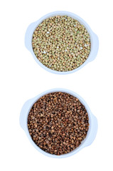 Bowls with buckwheat on background