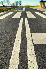 The asphalt road in the summer