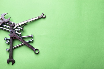 Set of brilliant nut keys on a green background