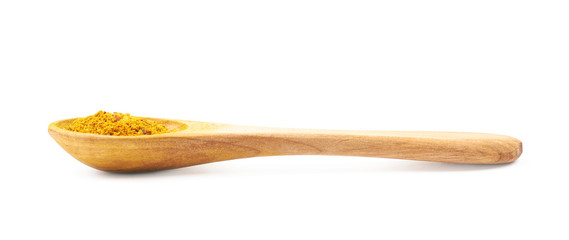 Spoon full of yellow curry powder