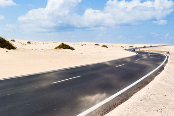 Sandstorm on the desert road on Corralejo dunes.Fuerteventura. Canary Islands. Spain © alexanderkonsta