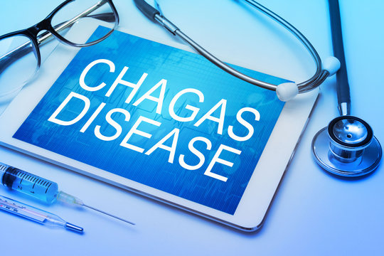 Chagas Disease word on tablet screen with medical equipment on background
