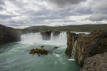 Godafoss is a very beautiful Icelandic waterfall. It is located on the North of the island not far from the lake Myvatn and the Ring Road.